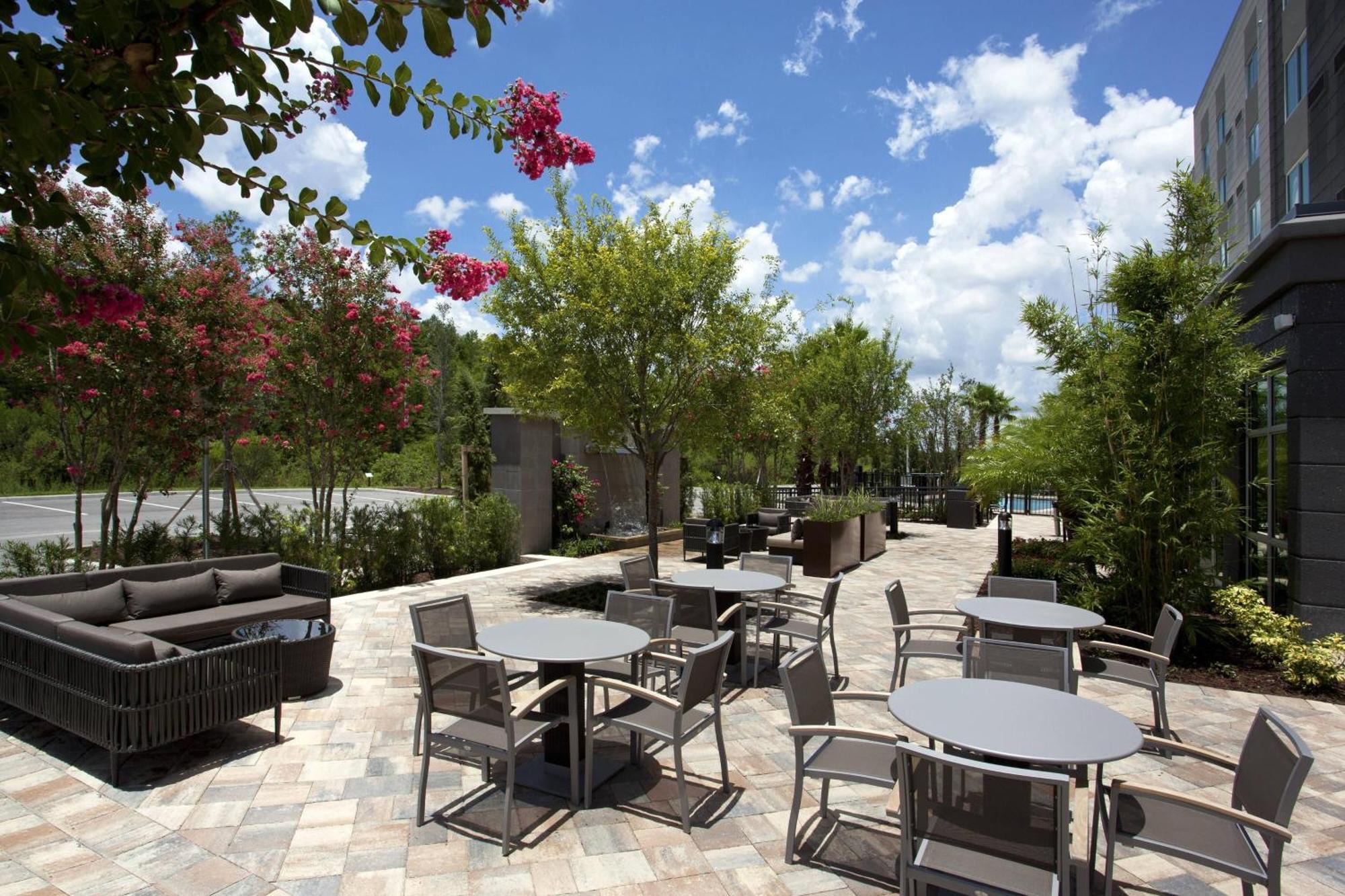 Courtyard By Marriott Orlando South/Grande Lakes Area Hotel Exterior photo